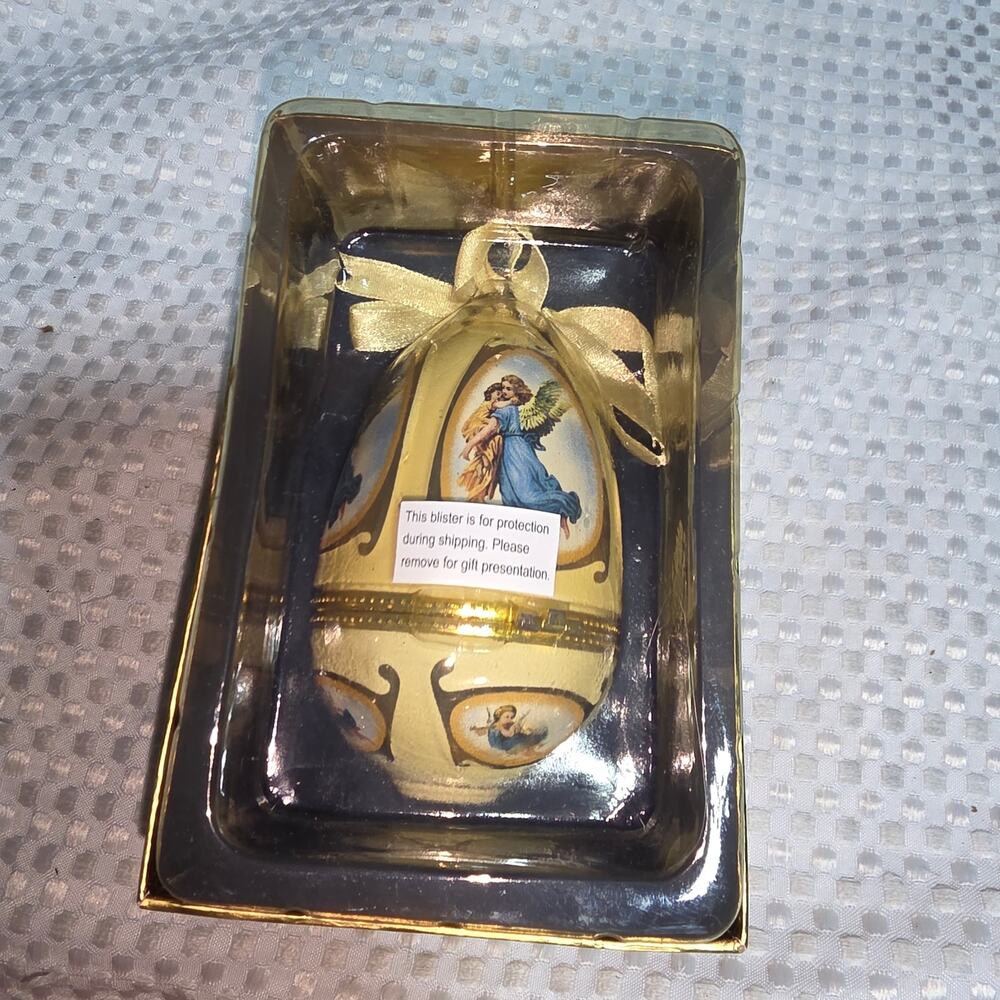 VINTAGE MR CHRISTMAS  VALERIE PARR HILL ORNAMENT EGG MUSICAL